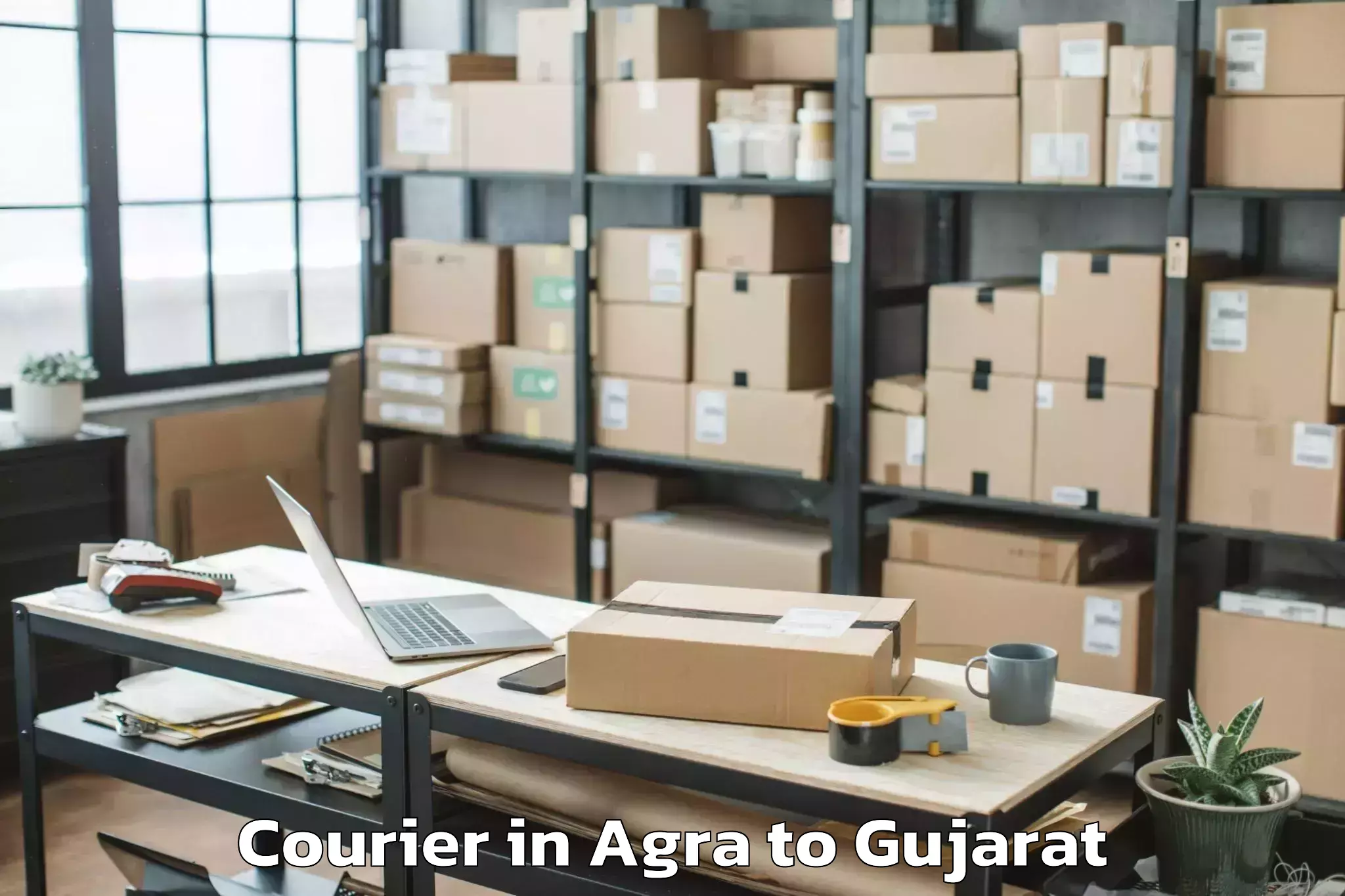 Book Your Agra to Amod Courier Today